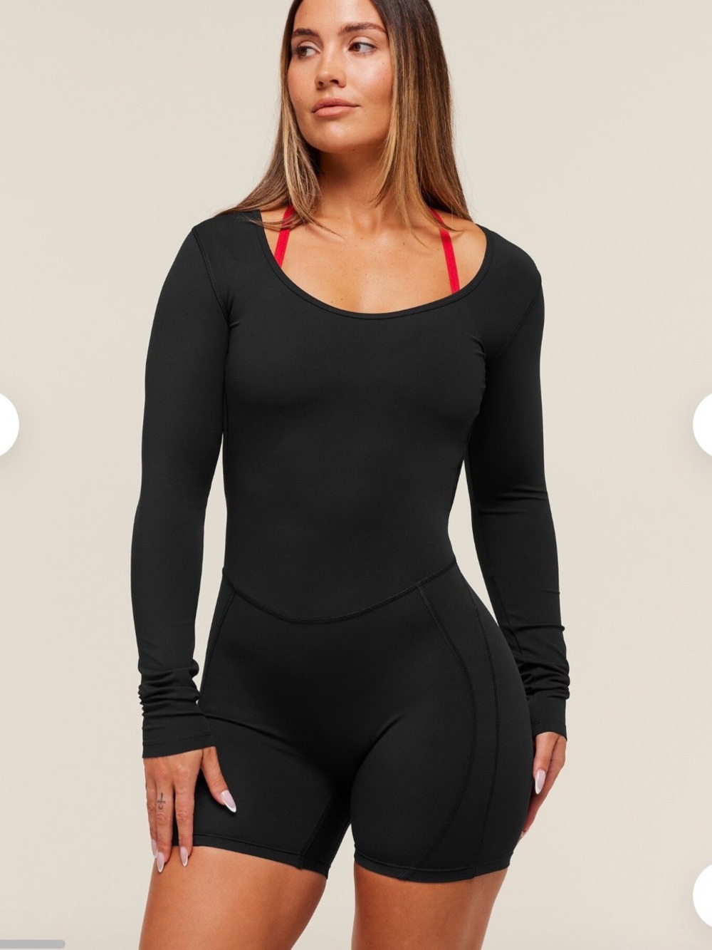 Gymshark Black Long-Sleeve Scoop-Neck Romper with Red Strap Accent